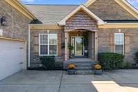 Covered front porch welcomes you.