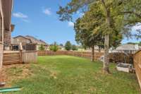 Spacious back yard with mature trees!