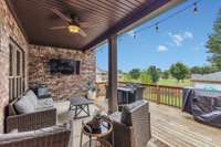 Covered porch and deck is great for relaxing or entertaining