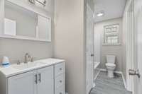 Primary Bathroom with access from Primary Bedroom and Hallway