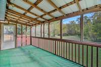 Covered and screened-in deck off Primary Bedroom