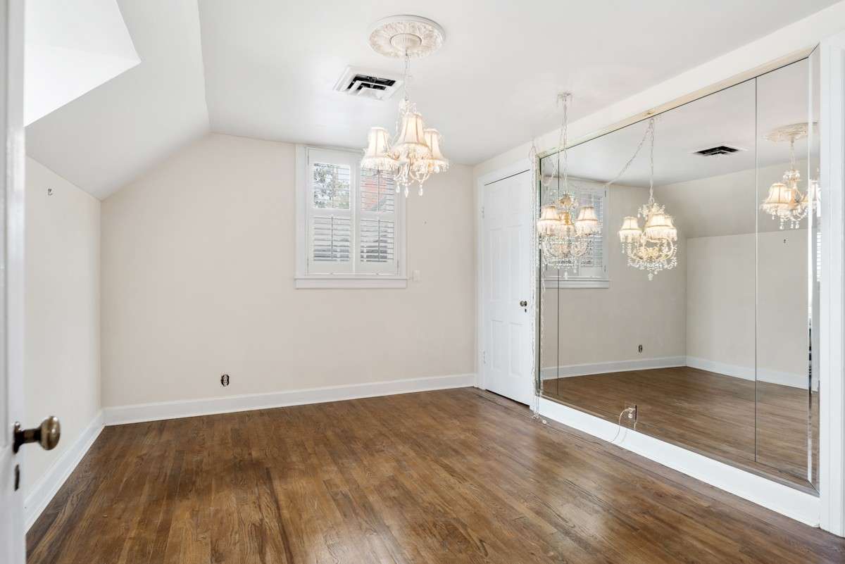 Bedroom Up 2 Clostets and Original Hardwoods in excellent condition