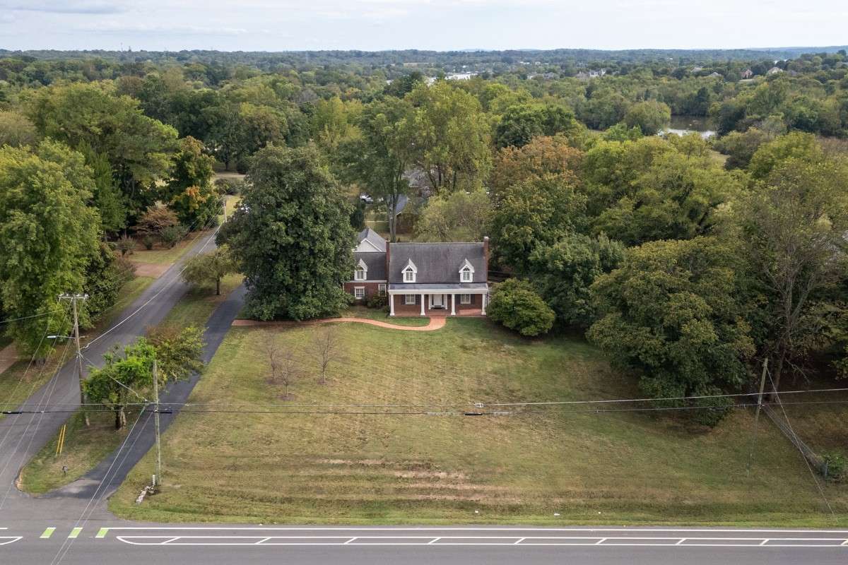 Nestled among the Trees, situated on  1. 2 Acres combines  all City Amenities necessary
  to begin a Project