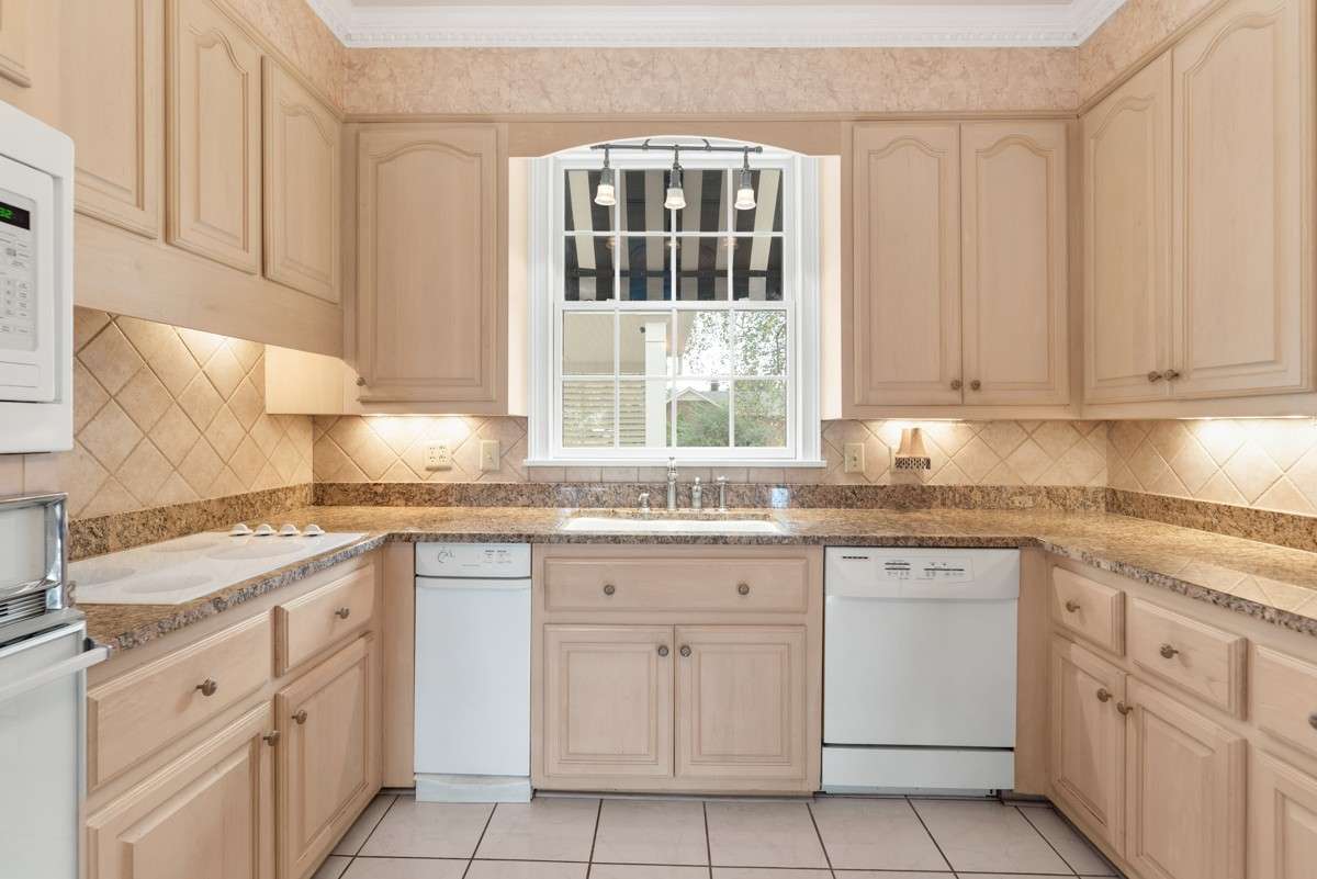 Granite , Tile, Appliances minus Refrigerator will remain
