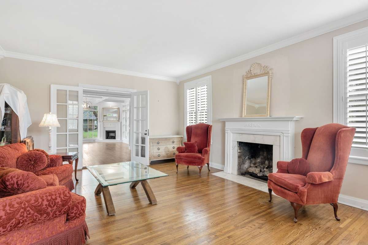 Main Living Room, Gas Logs, Sparkling Hardwoods, French Doors, Plantation Shutters