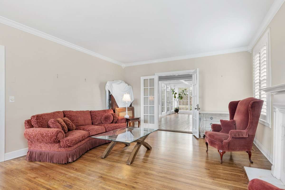 Crown Moldings throughout, often the Primary Gathering area, Opens into the Sun Room