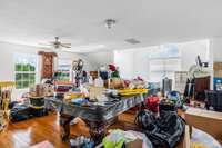 View of above the garage that is used for storage currently and is a fantastic flex space!