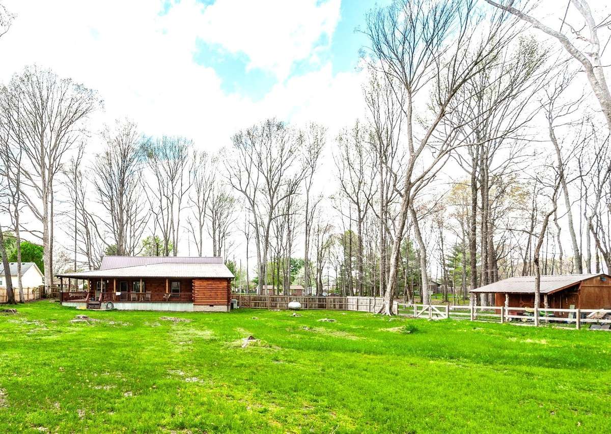 Great outbuilding and plenty of firewood!