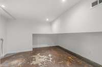 This room is just off of the bonus room space. Has a glass door to enter and does not have a closet therefore it is not a bedroom.