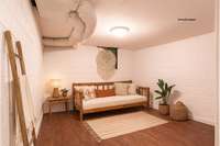 This space was used as a storage room but the previous owners did use this room as a fifth bedroom. This room is located close to the bathroom in the basement.