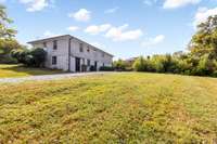 Plenty of room to play... You own almost all the way to your neighbors driveway. Fence it off for your privacy.