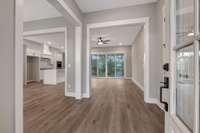 Example of the front entry and open floorplan from the same floorplan under construction down the street.