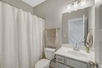 Full bathroom with tub/shower combo
