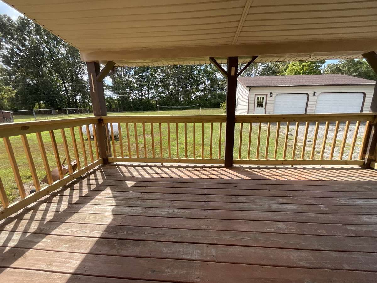 Don’t worry about those rainy days! You have a covered porch to hang out on and relax with your favorite beverage.