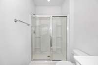 Primary Bath - Tile flooring, double vanities, recessed lighting