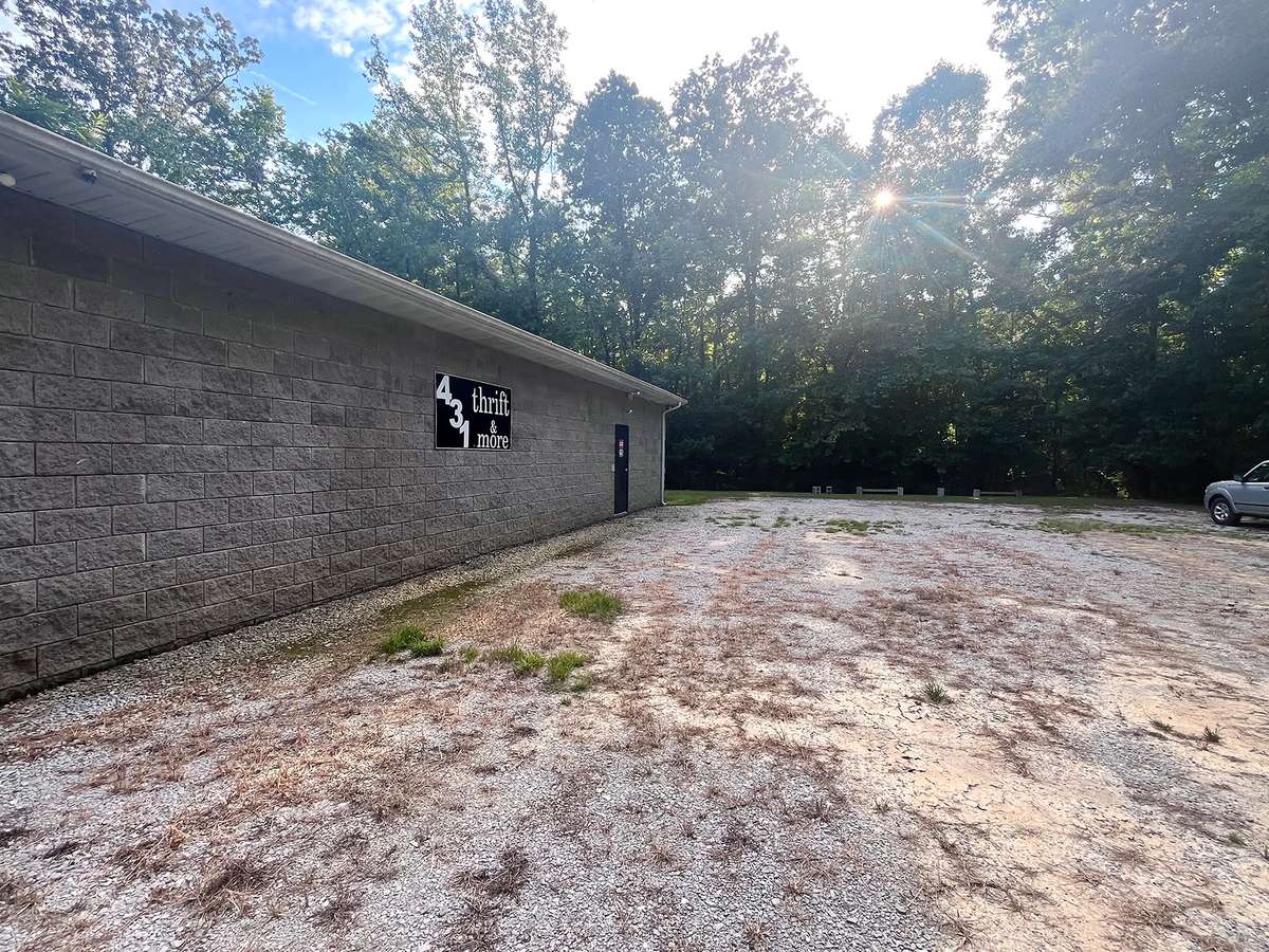 Plenty of parking for patrons on large gravel lot.