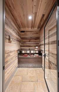 Discover the walk-in humidor. You’ll find an antique cigar display case from 1907.