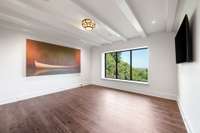 With arguably the best skyline view in the house, the additional gathering space off of the secondary kitchen is perfect for entertaining, or even a home office.