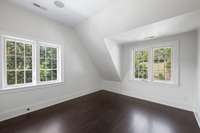 This room is perfect for an office, playroom or additional guest room. This is the only bedroom on the third level without an en-suite bathroom.