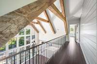 Custom beams adorn the ceiling and make for a gorgeous focal point of the home.