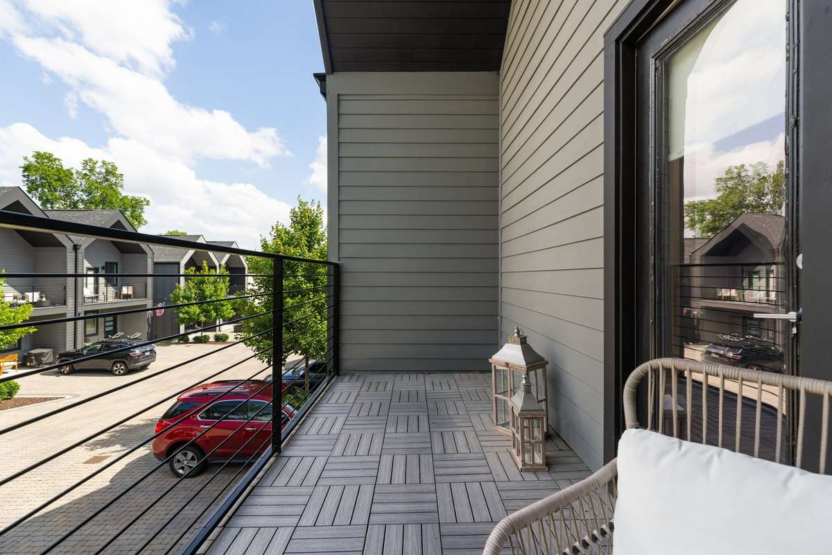 A closer look at the upstairs patio. Plenty of room for chairs, a table, plants. You decide!