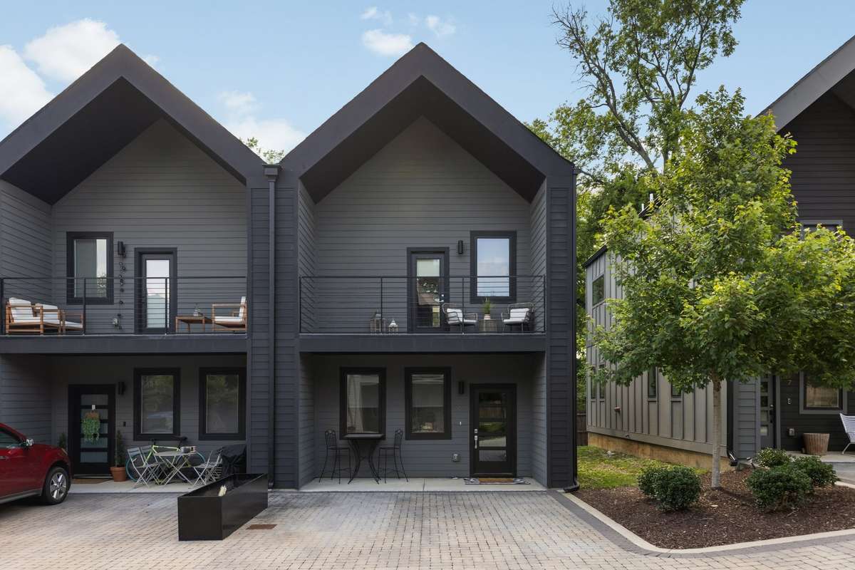 You have a lovely covered porch and an upstairs covered patio located right off of the  primary bedroom. Enjoy Tennessee springs and autumns on your upstairs patio. Grow plants, read books, relax and unwind after a long day.