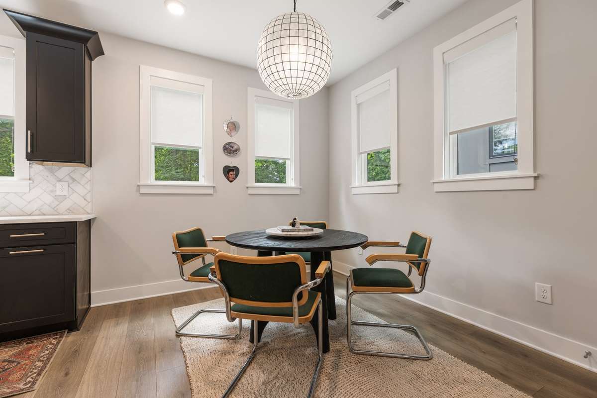Lots of windows and custom blinds allow you to choose how much light you want in this space.