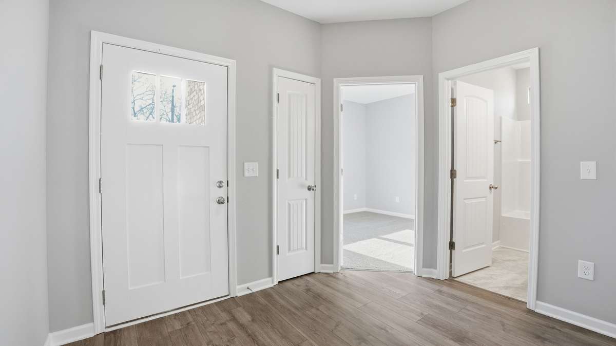 foyer. Craftsman style front door.