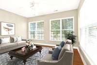Sunroom Virtually Staged.  Wonderful space to be used for whatever purpose your family needs!