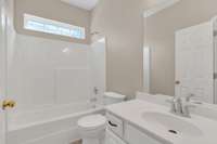 Three full bathrooms in the home. . .  this one on the main level!  Clean, fresh and ready!