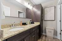 Upstairs full bath with built in cabinet