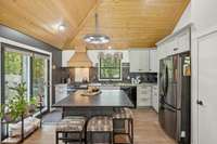 Island adds valuable workspace and extra seating.