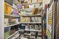 Closet is currently used for the home business, but could easily be converted back to a standard extra large closet.