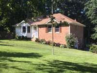 Charming home sitting proudly on 4.25 acres at the end of a cul de sac!