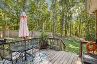 Large deck off of the kitchen with outdoor lighting.  A great spot for your morning coffee or to unwind at the end of a long day!