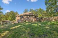 Back view of the home.  A second pedestrian door was added to the basement to come out to the back yard.