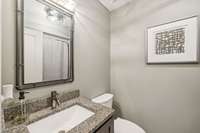 Full hallway bath, renovated with stone vanity top.