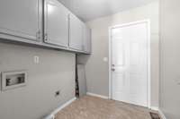 Laundry room with garage entrance