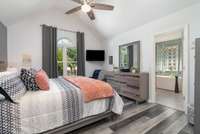 Primary bathroom off the living room and foyer, again enjoy the high ceilings and new windows