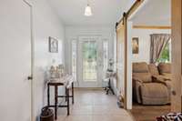 Sliding barn doors by the entryway.  564 Hodges Road Smithville, TN 37166