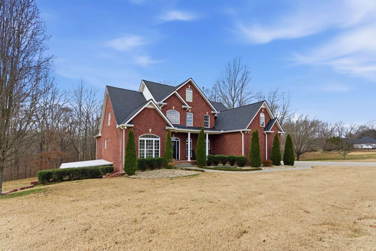 Welcome home to 1014 Alameda Dr, a stunning all-brick estate in the prestigious Dogwood Springs neighborhood on the Gallatin side of Portland—just minutes to Highway 109 and all the amenities of Gallatin, while still feeling tucked away and peaceful.