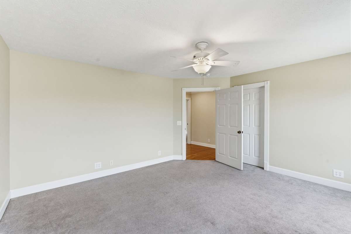 Bedroom #3 with built-in cabinetry, walk-in closet and beautiful views!