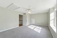 Spacious Bedroom #2 on one end of upper hallway, double closets and views of property!