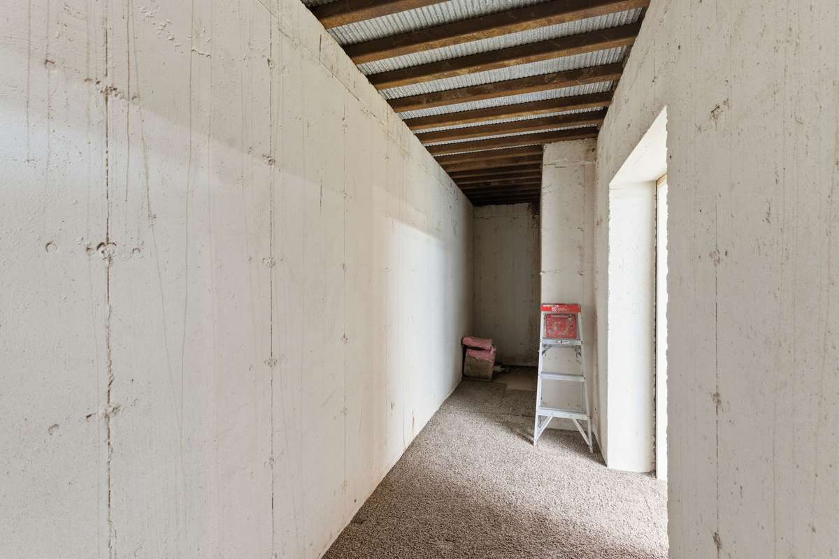 Dedicated concrete storm shelter providing added peace of mind and secure protection during severe weather.