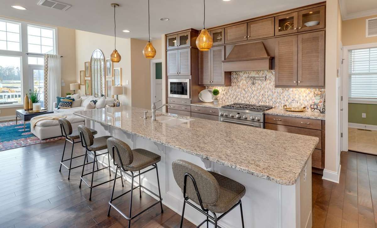 Images highlight the potential of this floorplan, shown here from a completed model home. Final design and finishes of your to-be-built home will be determined by your personal selections