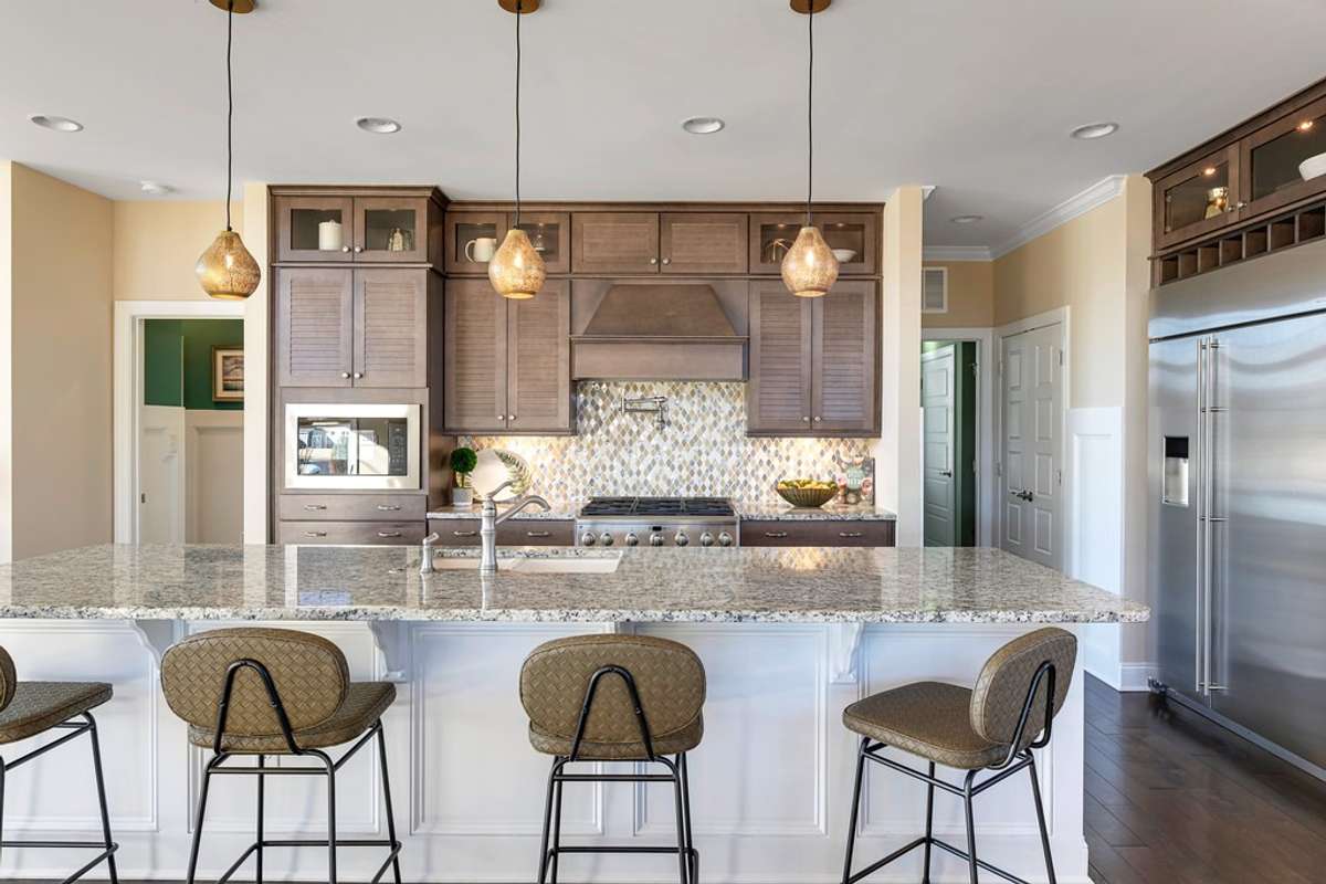 Images highlight the potential of this floorplan, shown here from a completed model home. Final design and finishes of your to-be-built home will be determined by your personal selections