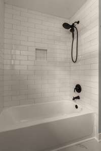 Updated bathtub offers a fresh, modern touch to the bathroom.