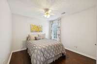 3rd bedroom with hardwood flooring