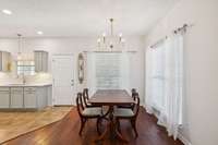 Family room to door leading to expansive covered porch.