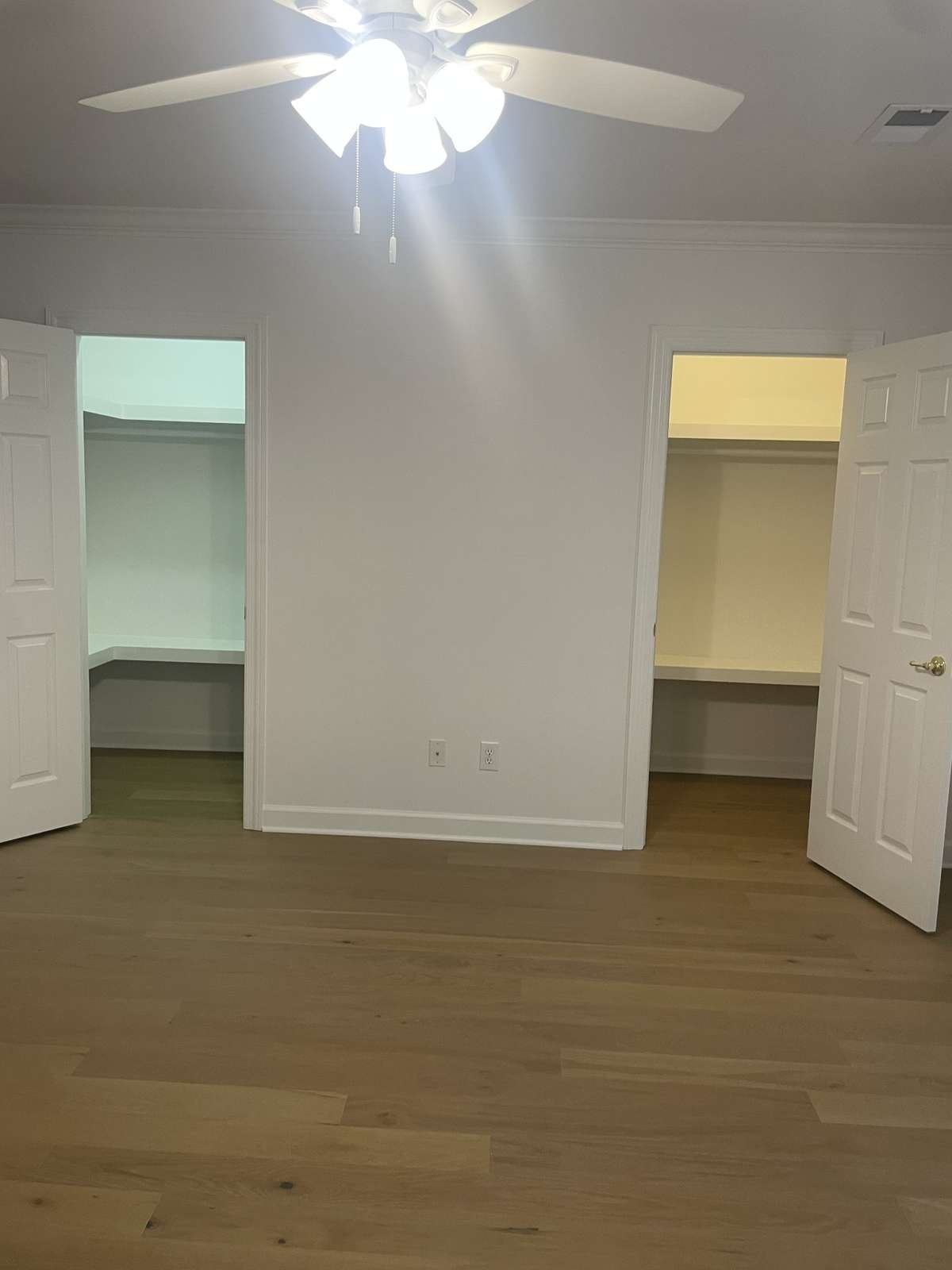 Primary Bedroom walk-in closets